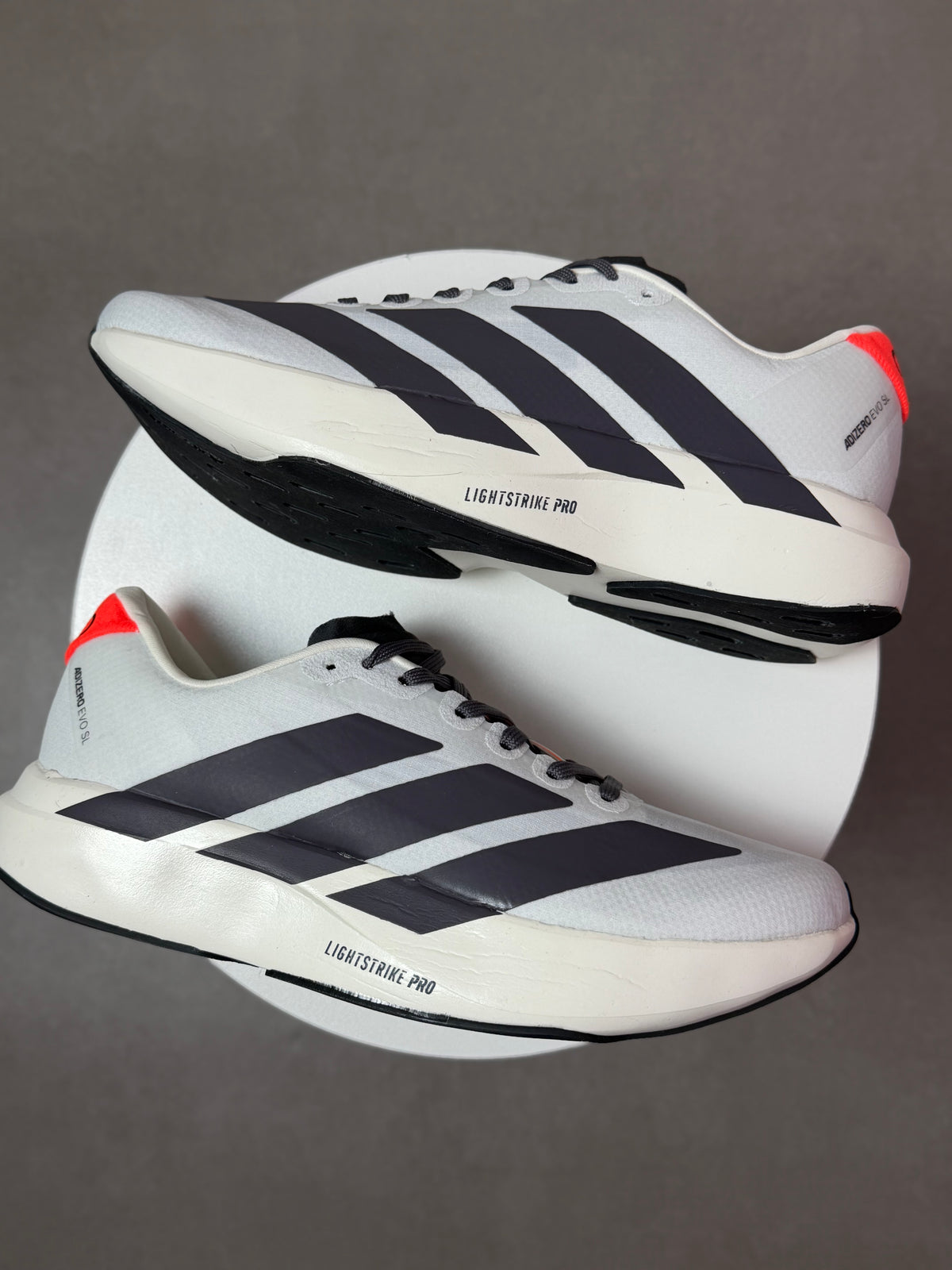 Tênis Adizero Evo - Branco/Preto/Laranja - Edição Especial
