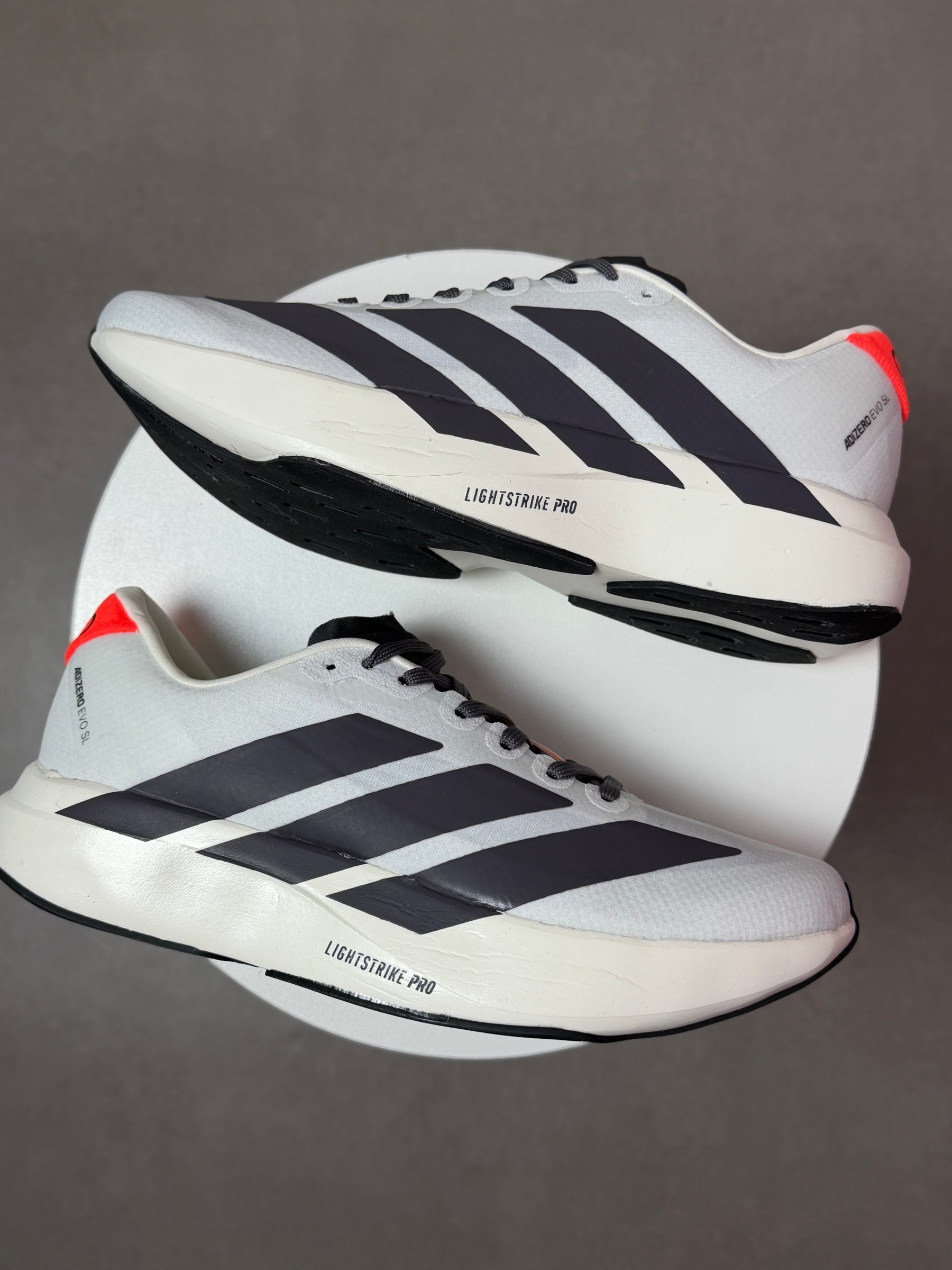 Tênis Adizero Evo - Branco/Preto/Laranja - Edição Especial
